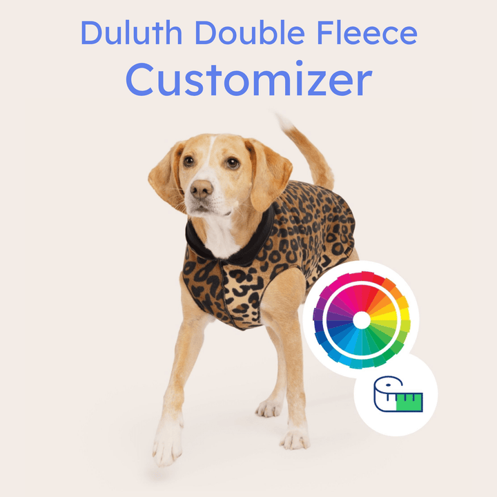 A dog wearing a leopard and black double fleece in front of an offering of customizations