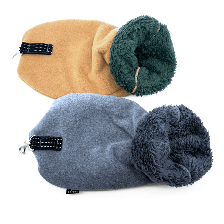 Two leash mittens in front of a white background. One is tan, one is grey.