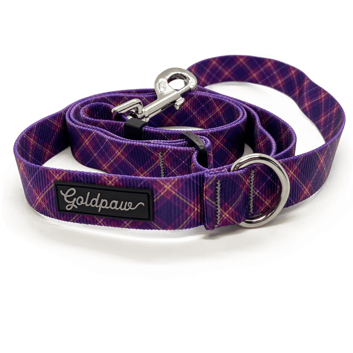 A mulberry plaid adjustable leash in front of a white background