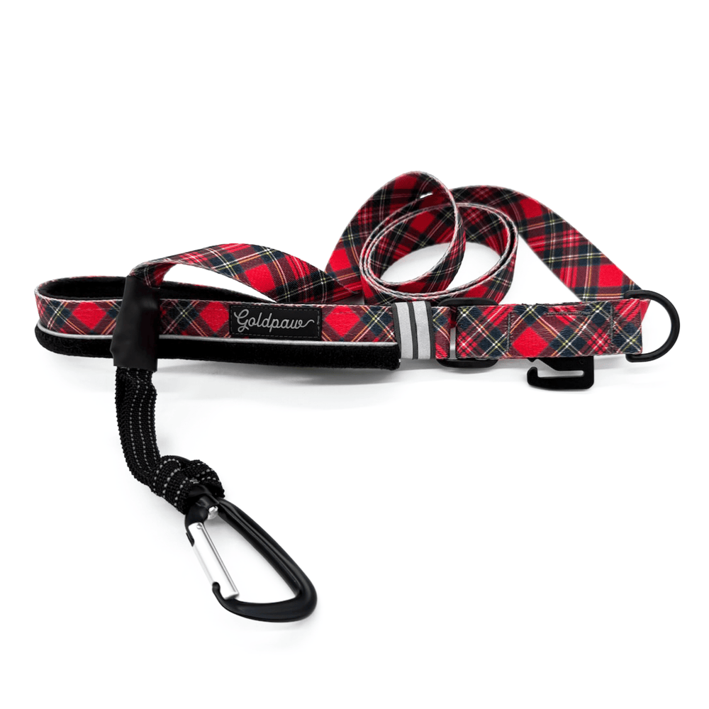 Red and black plaid dog leash with carabiner on a white background