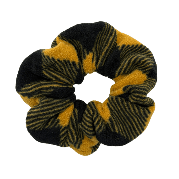 Gold and black buffalo check scrunchie on a white background
